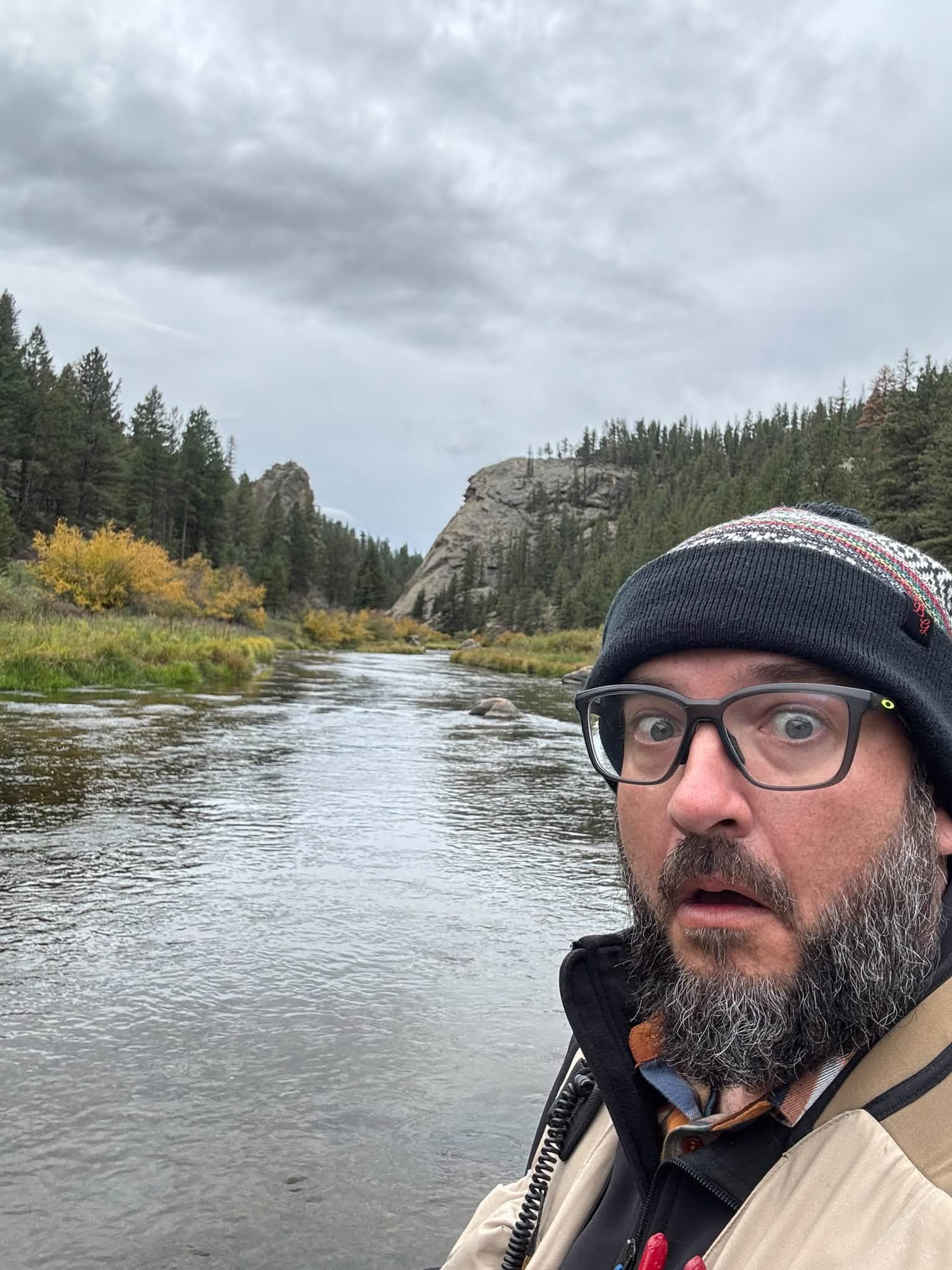 BJ beside a Colorado river